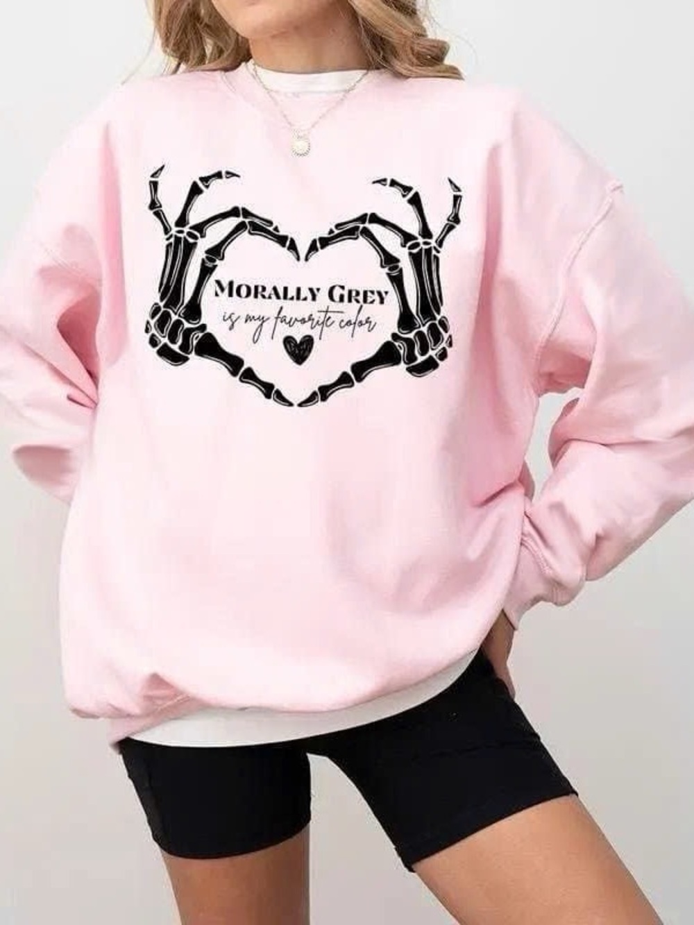 Pink Crewneck Sweatshirt with Black Skeleton Heart Graphic